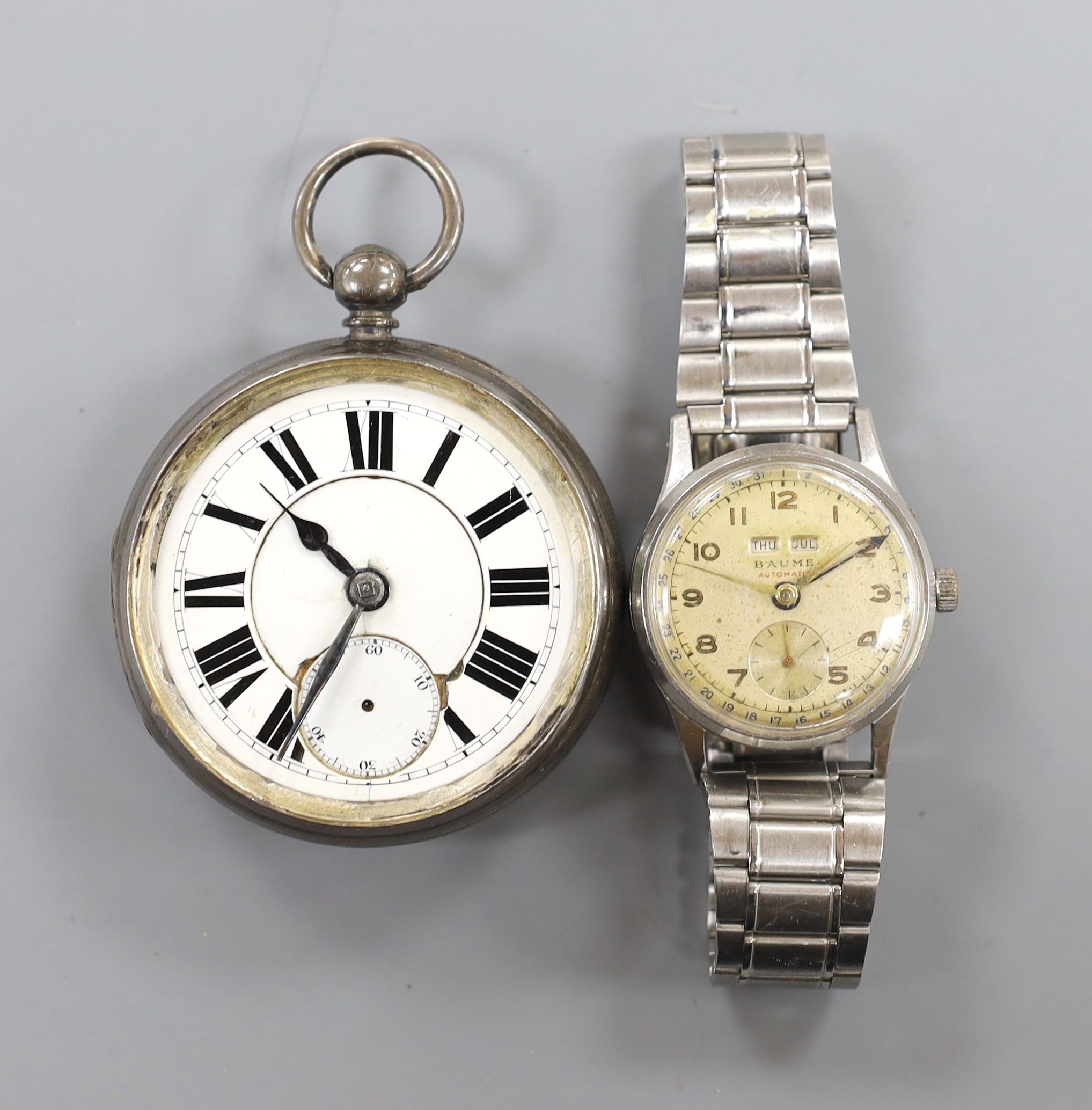 A gentleman's 1950's? stainless steel Baume automatic day/date wristwatch, on associated steel bracelet and a Victorian silver pocket watch.